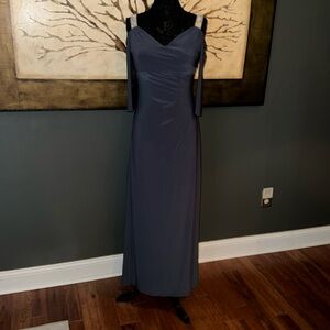 Elegant Dress Gathered throughout for flattering profile.  Rhinestone Cut Out.